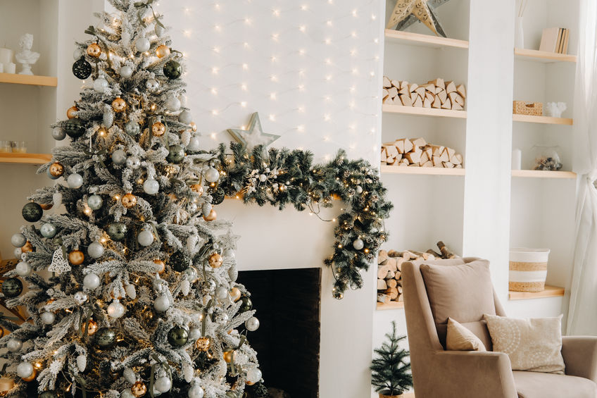 Christmas tree in the home Christmas interior. Decorated Christmas photo zone.